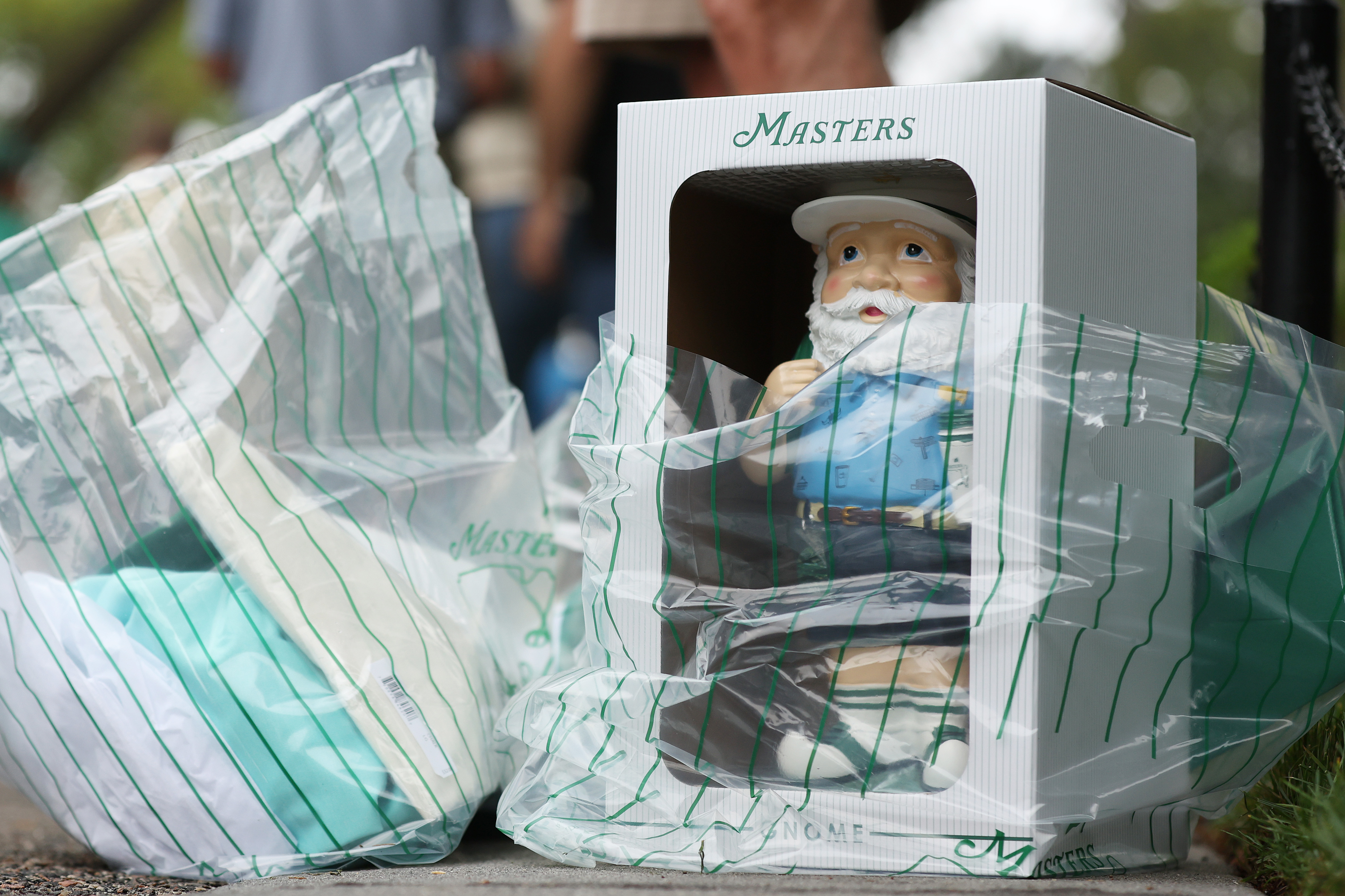 A Masters gnome seen in a shopping bag