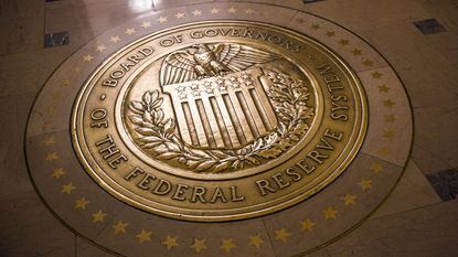 A gold plated Federal Reserve seal