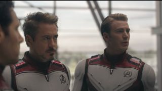 Robert Downey Jr listens as Chris Evans gives a briefing in Avengers: Endgame.
