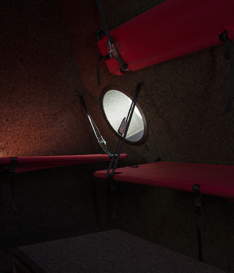 Aldo Frattini Bivouac, a little red mountain shelter in the pre-Alpine regions of Italy
