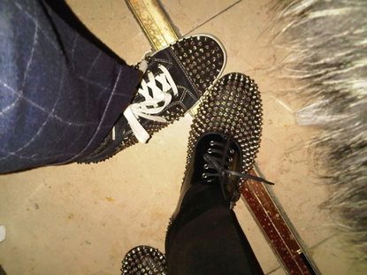 'The moment I ran into Christian Louboutin at the Sidaction dinner. He was wearing a pair of his studded sneakers and I was wearing the lace-ups.'