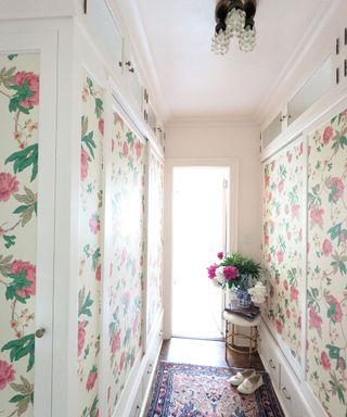 White floral wallpapered closet doors