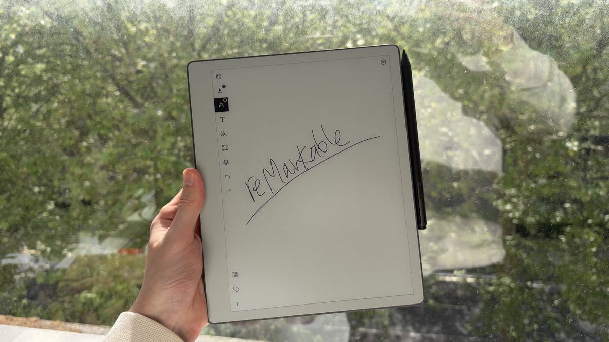 The reMarkable Paper Pure being held in the hand
