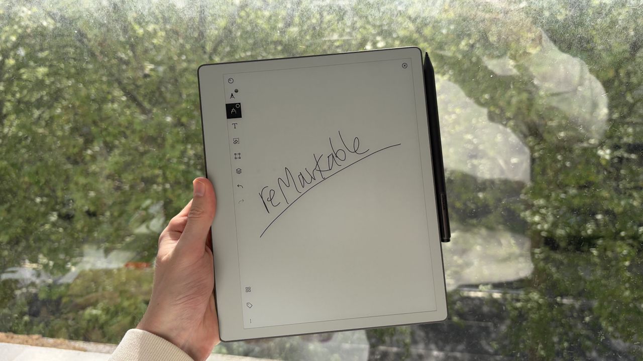 The reMarkable Paper Pure being held in the hand
