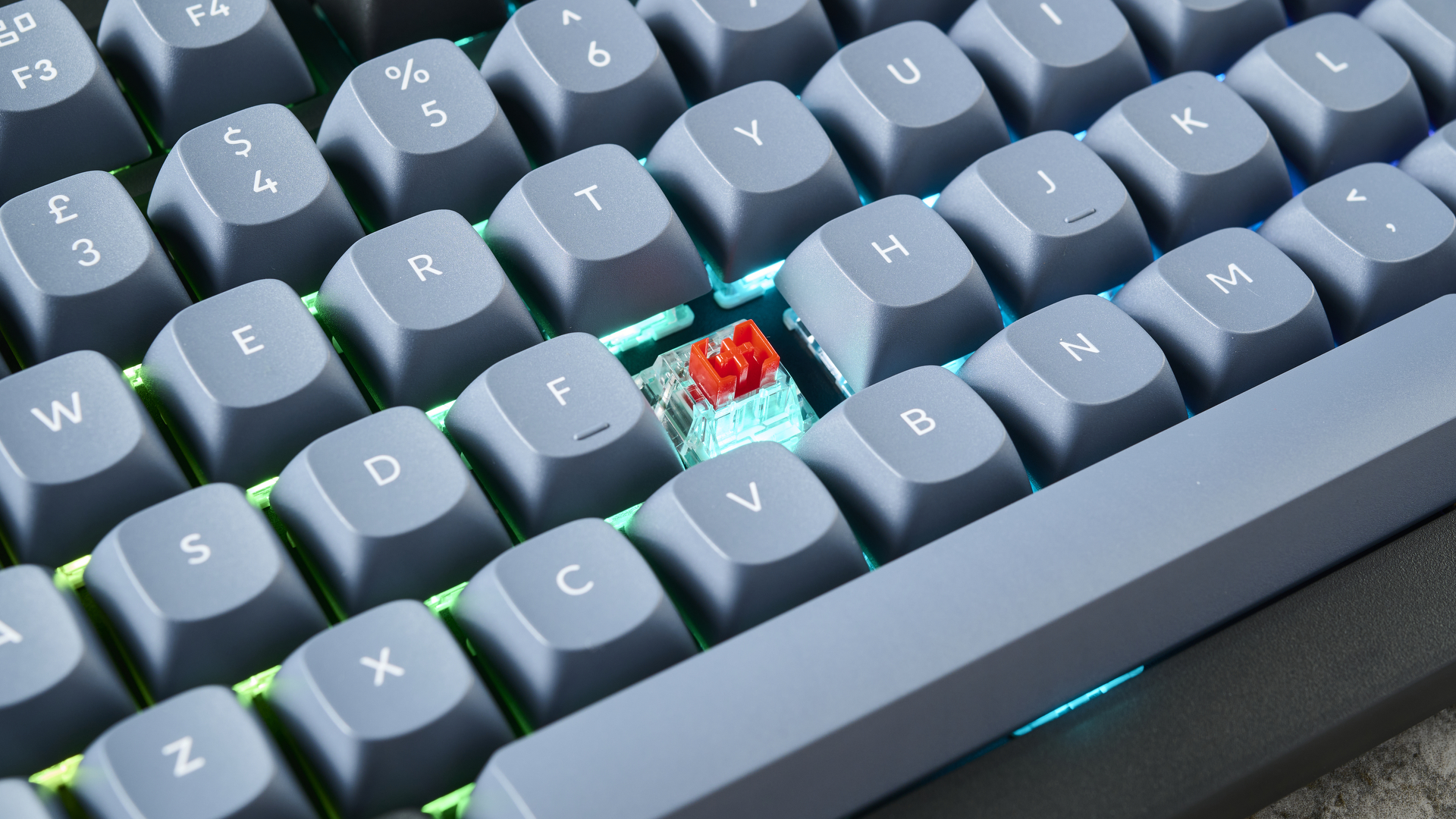 A Keychron V1 wired mechanical keyboard, in the frosted black (translucent) colorway