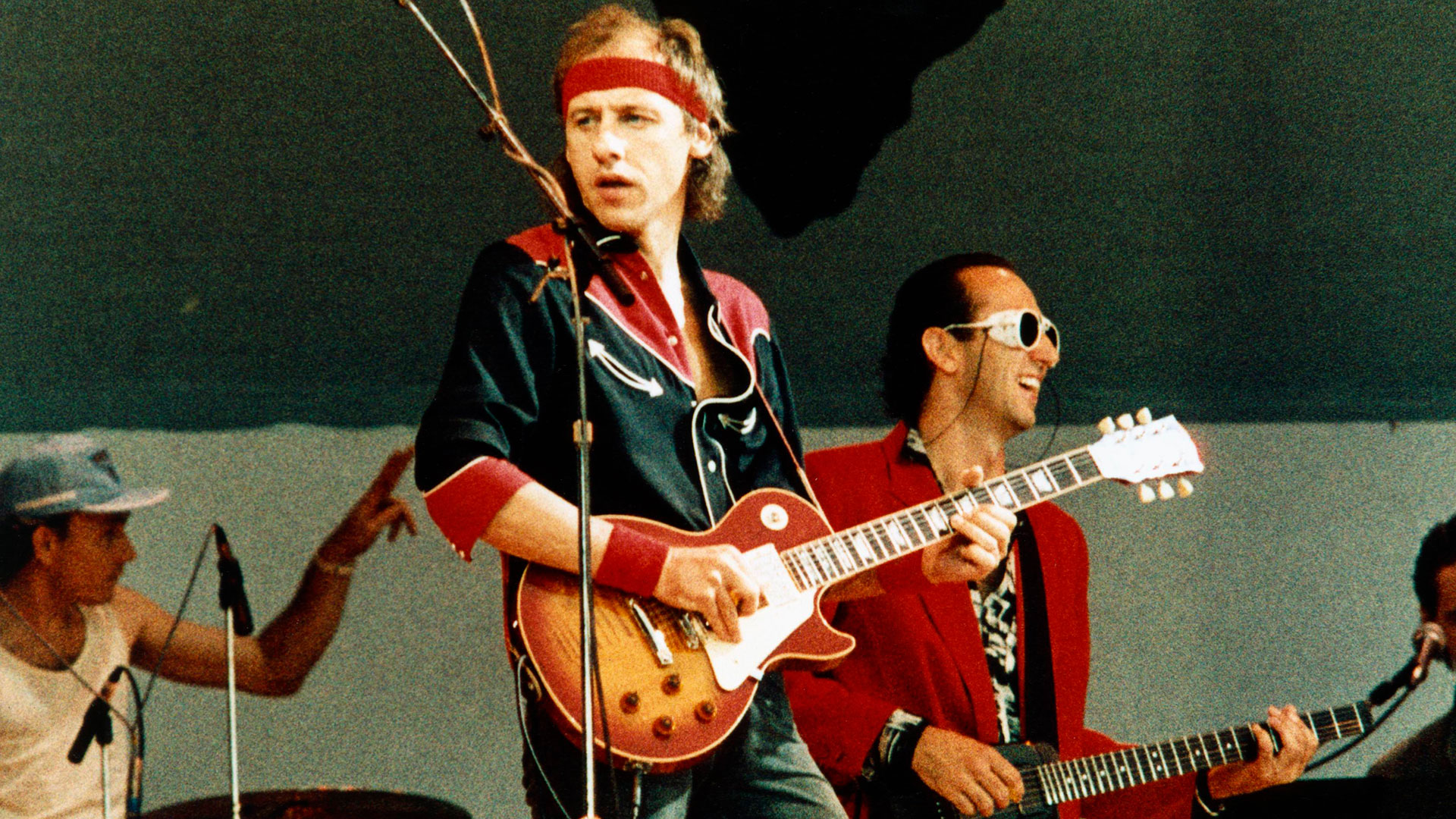 Mark Knopfler playing his Gibson Les Paul onstage at Live Aid in London on July 13, 1985