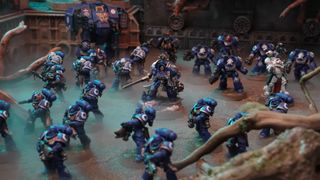 Space Marines line up on a misty battlefield in Warhammer 40,000 10th Edition