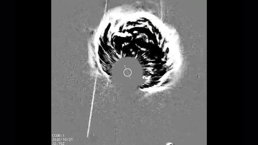 A gray scale image shows a plume of energy coming from the center of the image