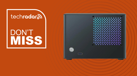 Rmatamini P99S mini PC on an orange background next to a TechRadar badge that reads 'Don't Miss'