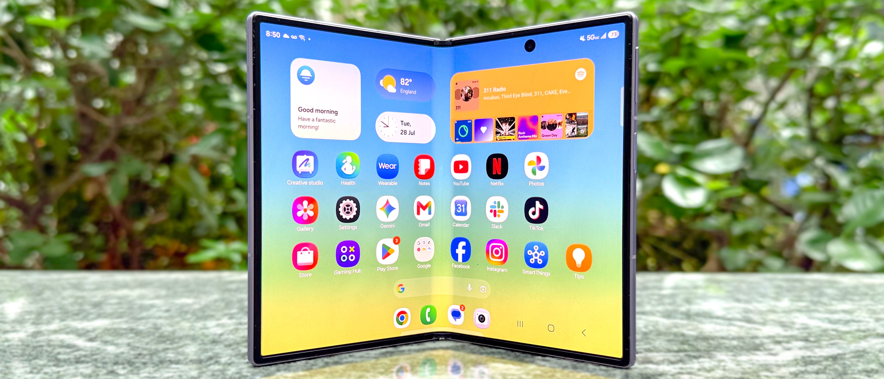 Samsung Galaxy Z Fold 8 shown open on a stone bench