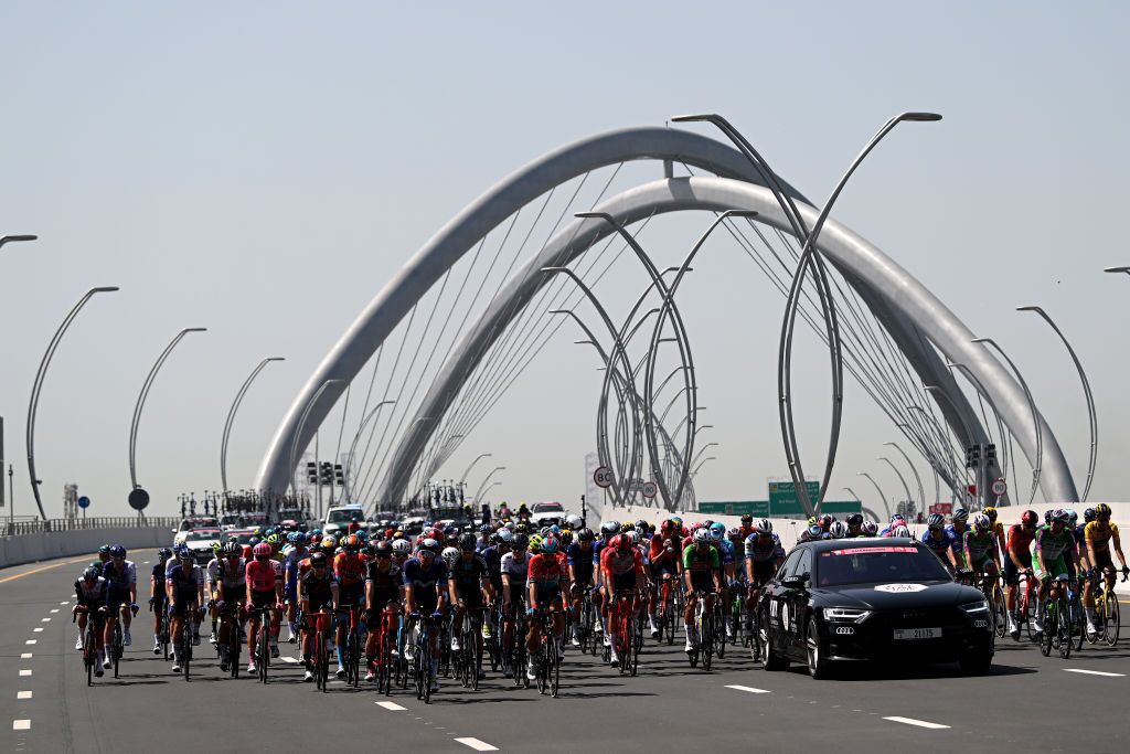 AL SHINDAGHA UNITED ARAB EMIRATES FEBRUARY 23 A general view of the peloton passing through the Infinity Bridge in Dubai prior to the 5th UAE Tour Stage 4 a 174km stage from Al Shindagha to Dubai Harbour UAETour UCIWT on February 23 2023 in Al Shindagha United Arab Emirates Photo by Dario BelingheriGetty Images