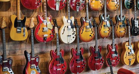 A wall of guitars at ATB Guitars