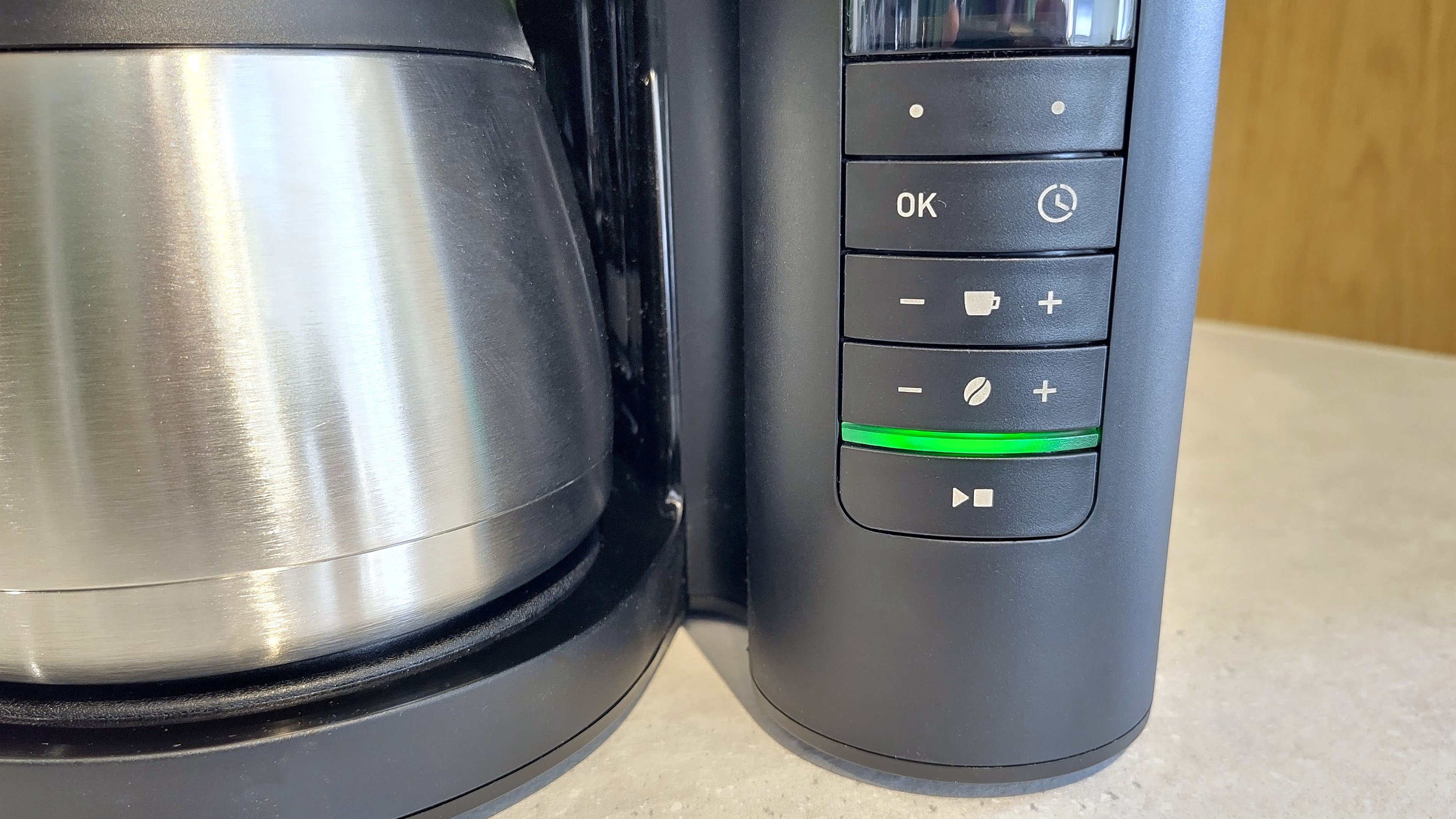 Controls for Melitta AromaFresh Pro Therm coffee maker with green brewing light active