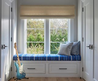 window seat with striped cushion