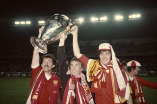 Liverpool players celebrate victory over Real Madrid in the 1981 European Cup final at the Parc des Princes.