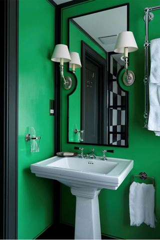 colors that go with black with a dark green painted bathroom and black doorway and mirror frame