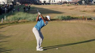 Tiger Woods of the United States plays his shot from the 18th tee during the first round of the 147th Open Championship at Carnoustie Golf Club