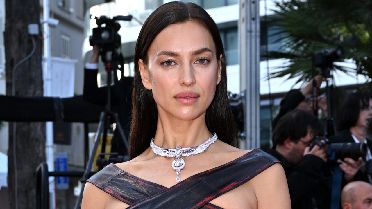 Irina Shayk wears a diamond necklace and a dress with a criss-cross neckline at the 76th annual Cannes film festival on May 21, 2023