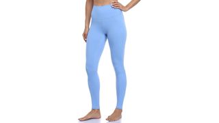 A model from the waist down wearing lilac blue high-waisted leggings, for the best leggings on Amazon.