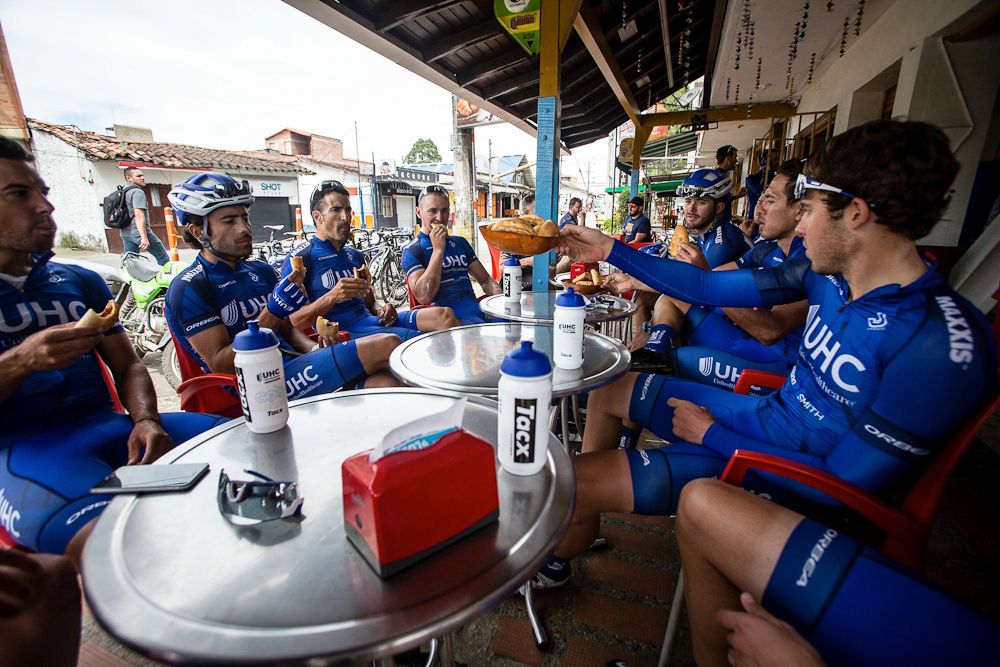 The men's team refuels at a sidewalk cafe.