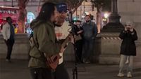 Chris Martin busking