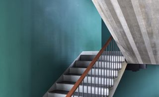 Stairwell with green coloured walls