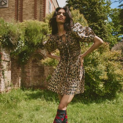 Woman wearing a leopard dress from one of our Zara alternative brands Damson Madder