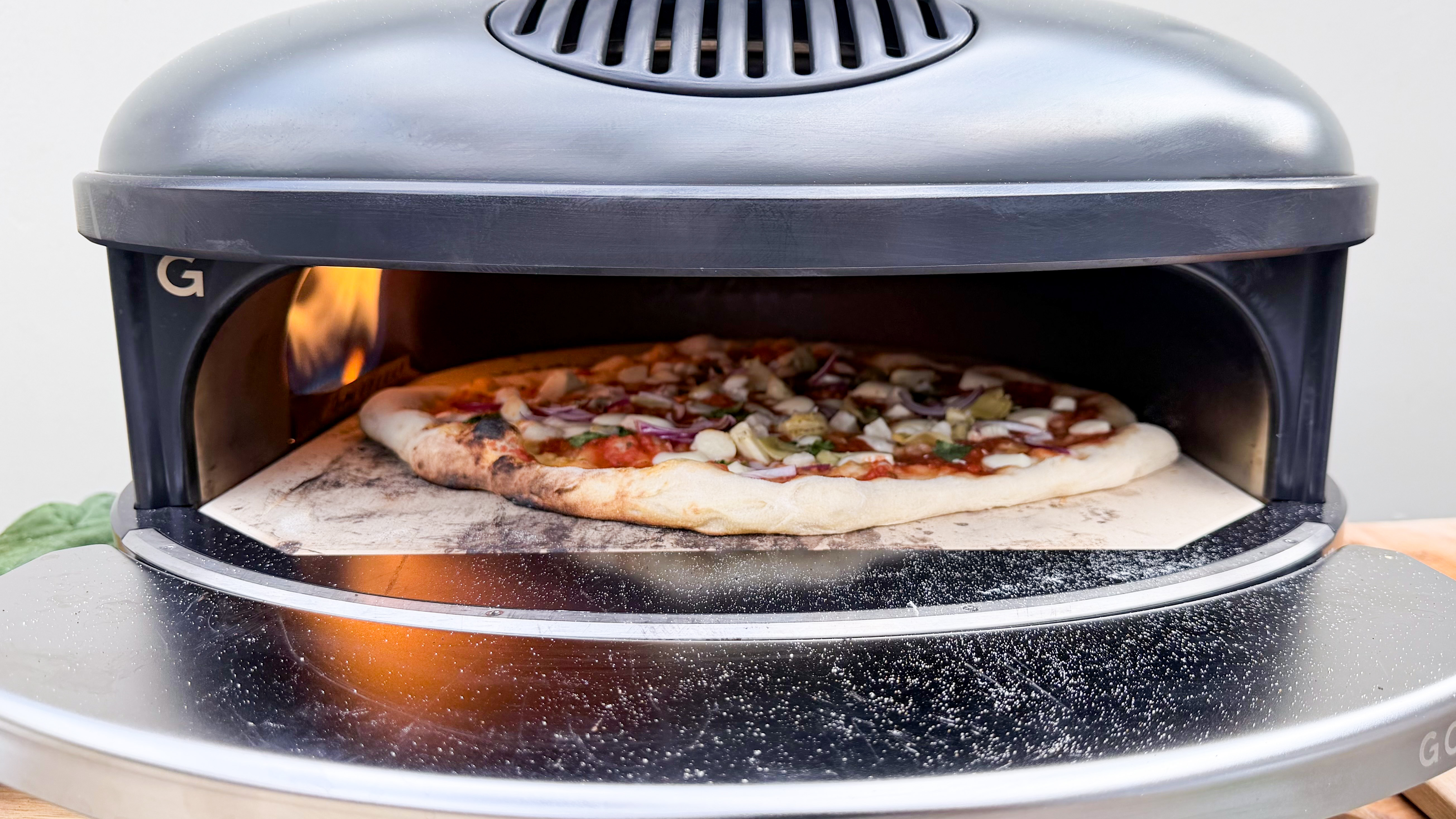 A pizza cooking in the Gozney Arc XL