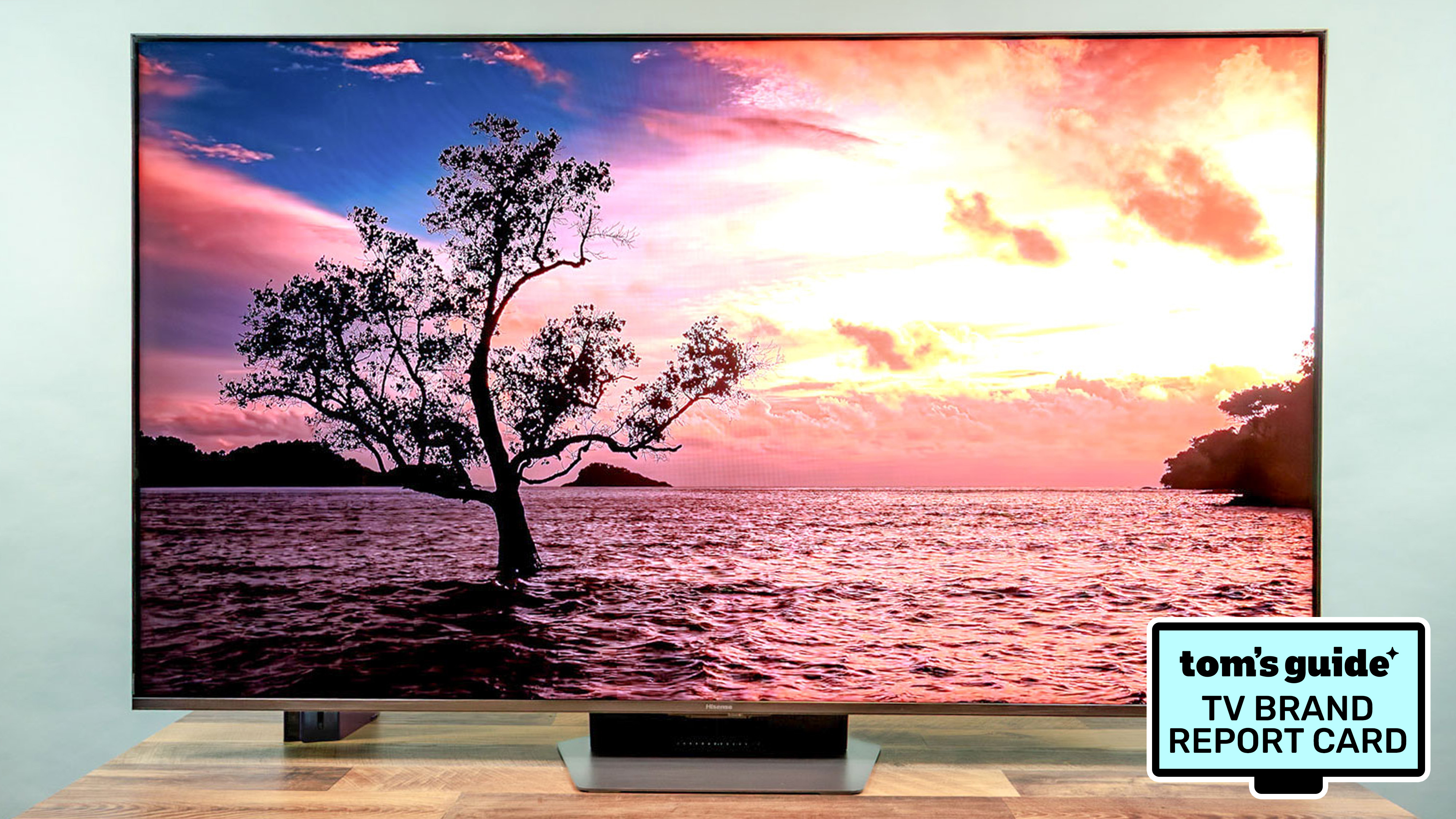 The Hisense UR9 RGB Mini-LED TV alongside a badge that reads: "Tom's Guide TV Brand Report Card"