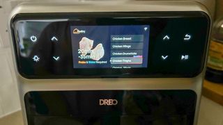 Dreo ChefMaker Combi Fryer has a preset timer for cooking chicken thighs