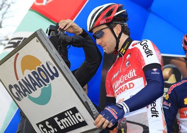 Race leader Andrea Palini (Team Idea) signs in