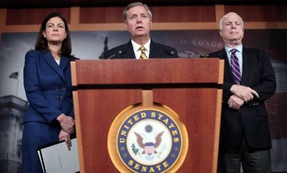 Sens. Lindsey Graham (S.C.), center, Kelly Ayotte (N.H.), and John McCain (Ariz.) continue to demand more information about Benghazi in order to vote on Hagel.