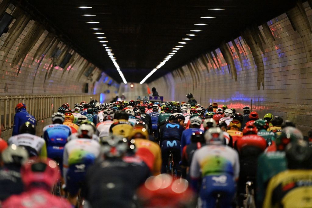 The pack of riders cycle through the Waaslandtunnel at the start of the mens race of the Ronde van Vlaanderen Tour des Flandres Tour of Flanders one day cycling event 2725km from Antwerp to Oudenaarde on April 3 2022