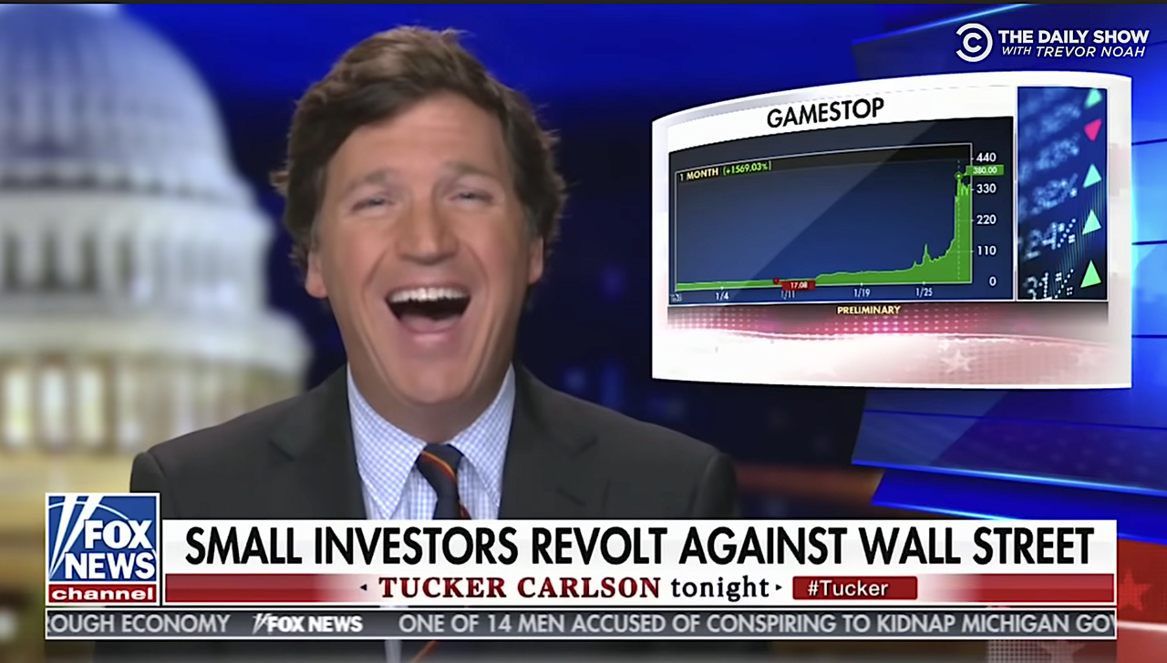 Tucker Carlson laughs