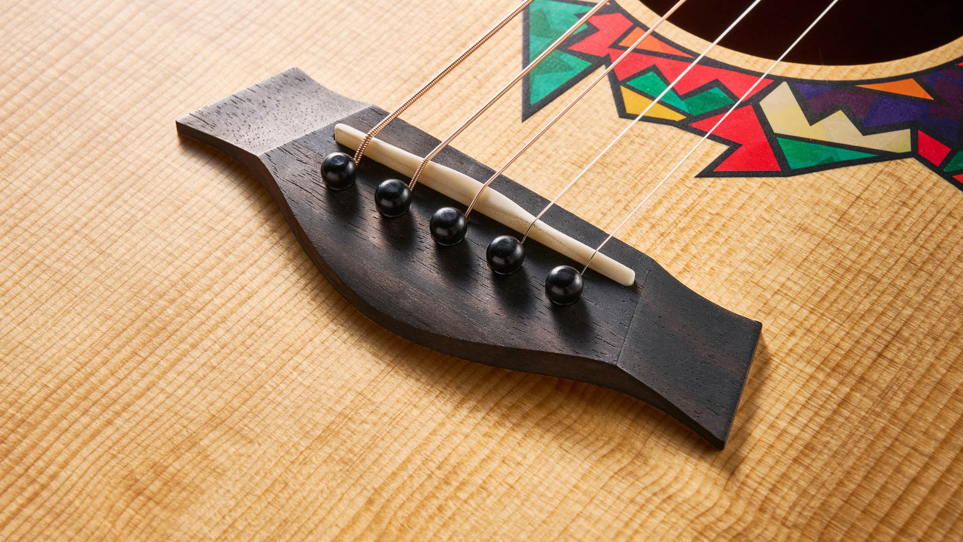 The Taylor Jacob Collier GS Mini is a compact five-string acoustic that encourages players to explore Collier's D-A-E-A-D tuning.