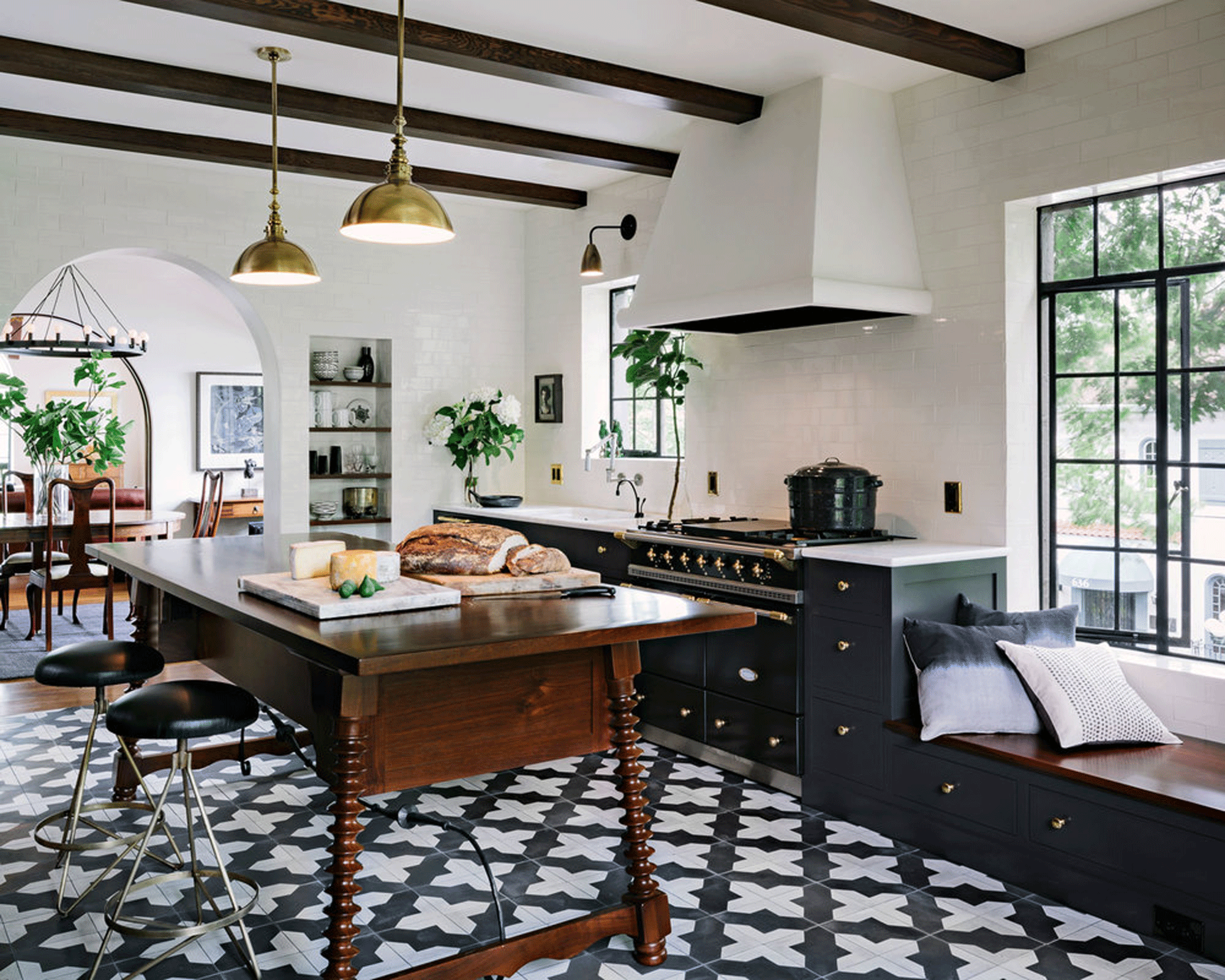 Kitchen with freestanding island and patterned floor