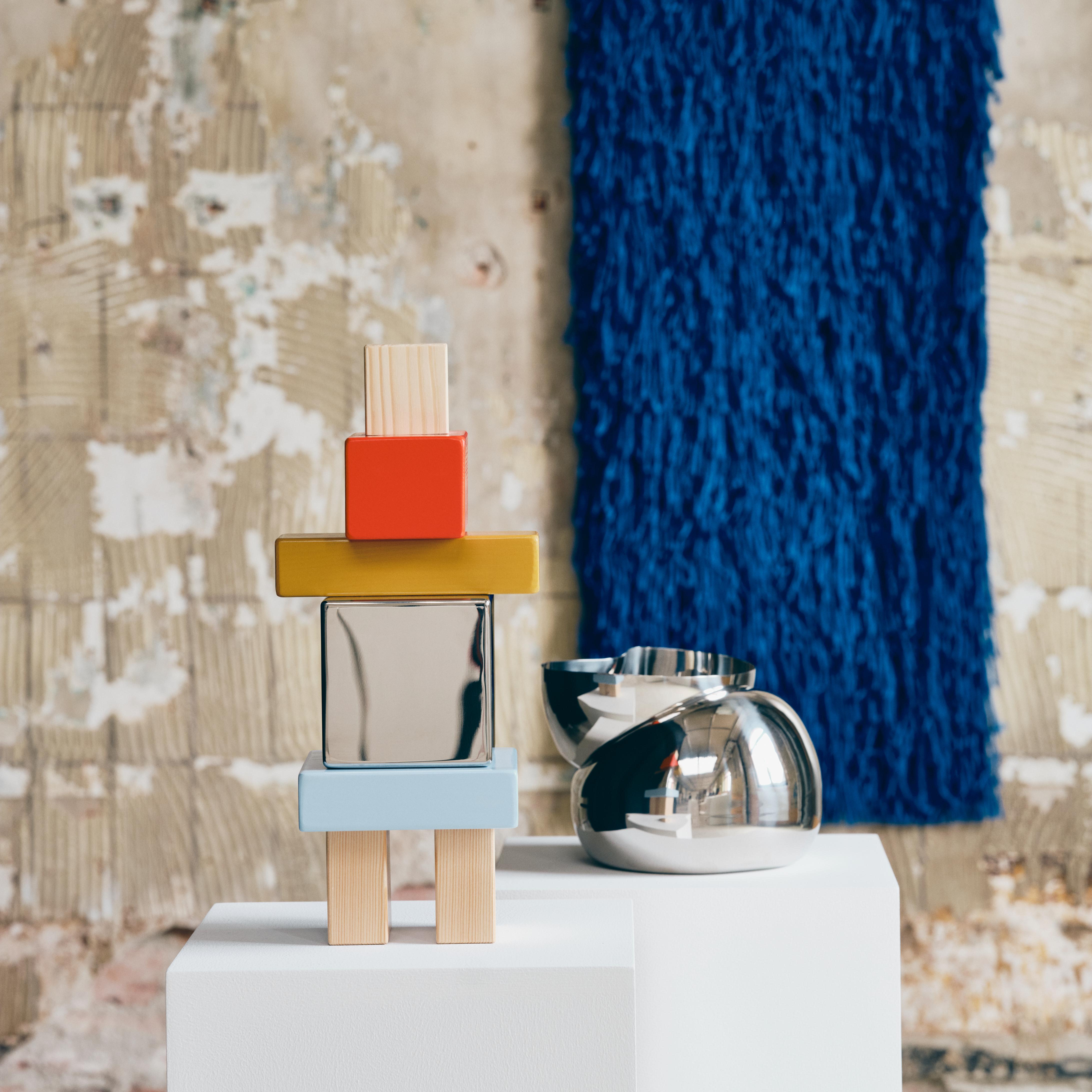 decorative objects displayed on plinths