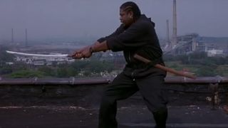 Forest Whitaker practicing his sword technique on a rooftop in Ghost Dog.