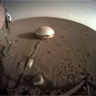 A daylight image taken by the Mars InSight lander's Instrument Context Camera, which is fixed in place, on Feb. 1, 2020.