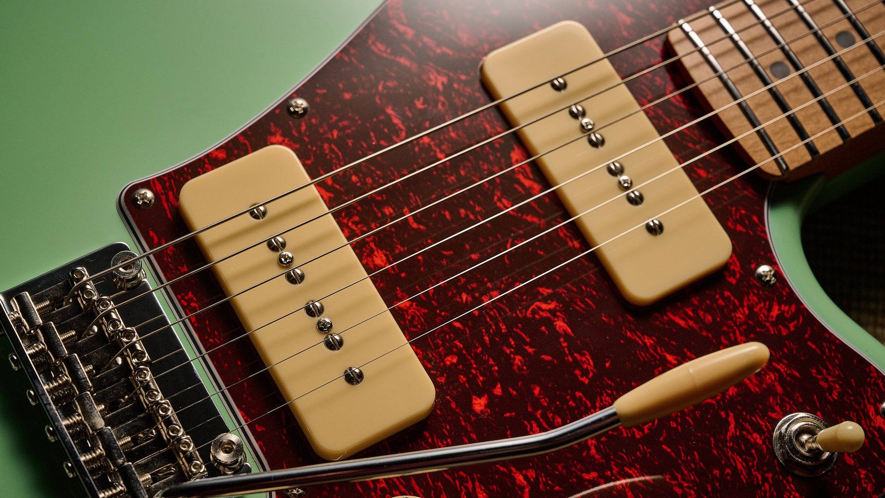 Close up of the P90 pickups on the Jet JJ-300 P90 electric guitar