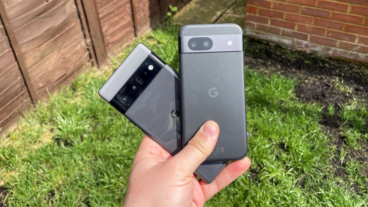 Google Pixel 8a and Google Pixel 6 Pro held together over green grass