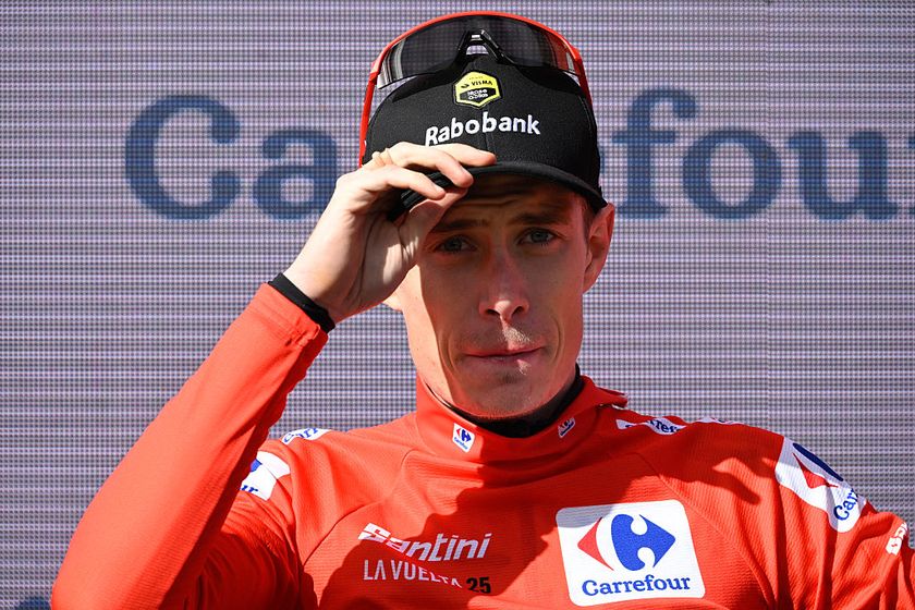 Overall race leader red jersey holder Team Visma-Lease a bike&#039;s Danish rider Jonas Vingegaard reacts on the podium after the 17th stage of the Vuelta a Espana, a 143 km race between O Barco de Valdeorras and Alto de El Morredero, Ponferrada, on September 10, 2025. (Photo by Miguel RIOPA / AFP)