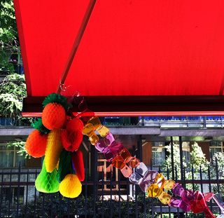 Paper fruit decorations hanging