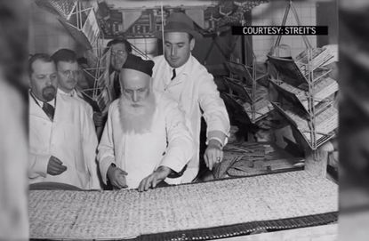 A rabbi blesses the matzo at Streit's, in New York's Lower East Side