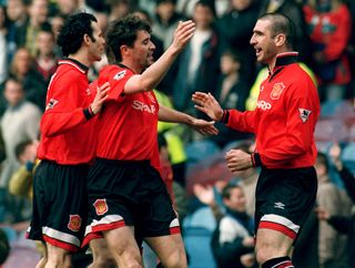 Eric Cantona and Roy Keane celebrate together at Manchester United