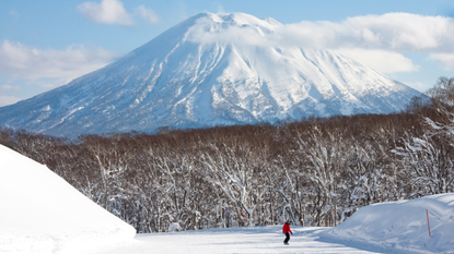 Person skiing in front of Mount Yotei, Niseko