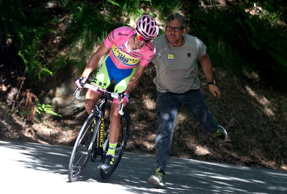 Contador gets a push after suffering a late mechanical.