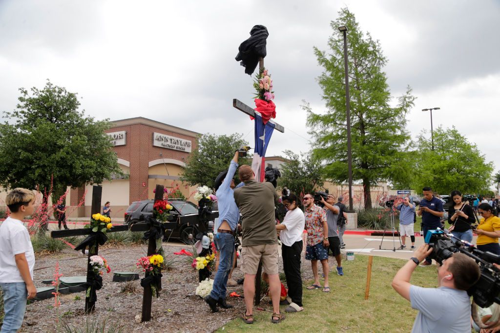 Gun victim memorial outside outlet mall in Allen, Texas