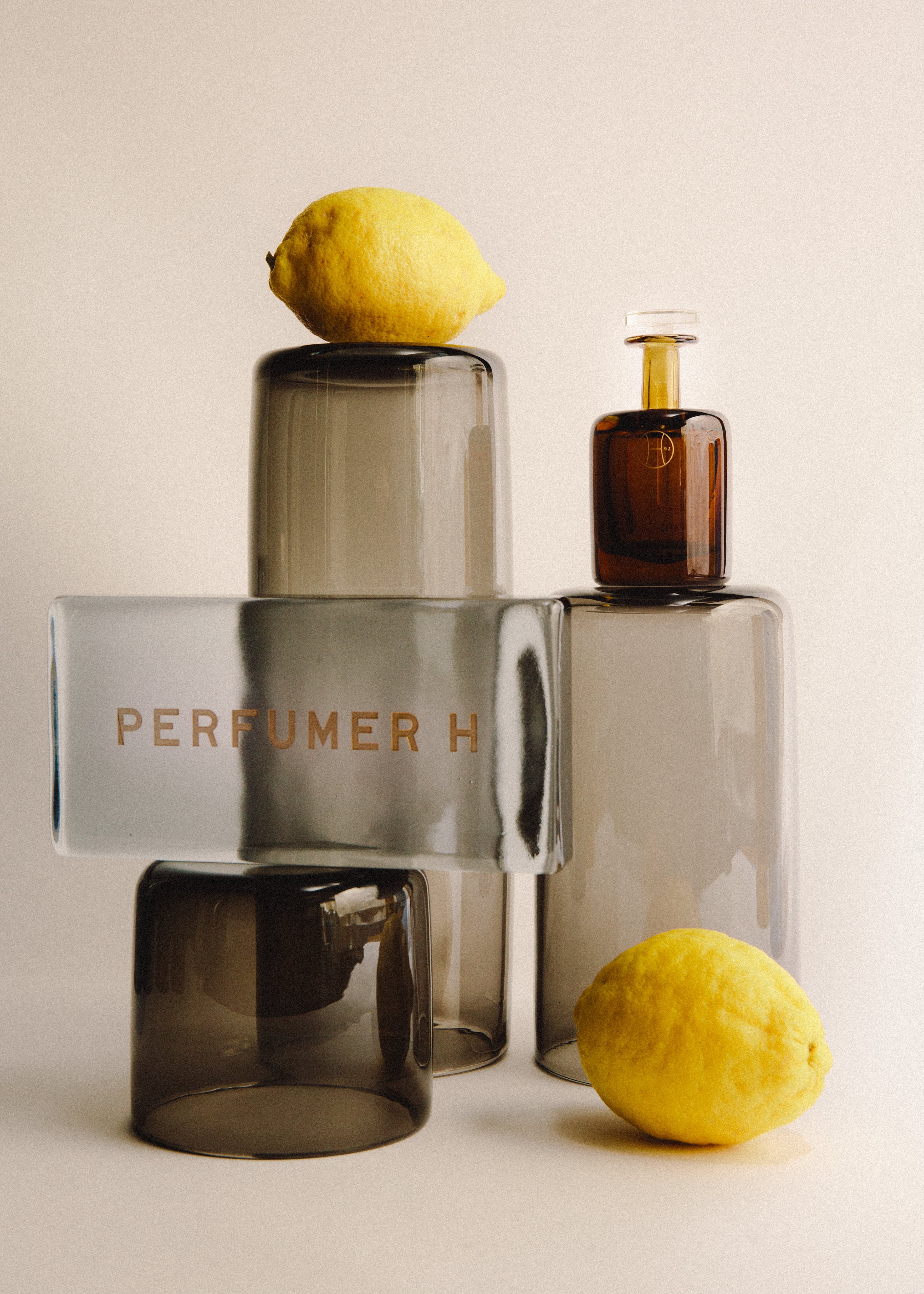 stacked glass bottles and lemons