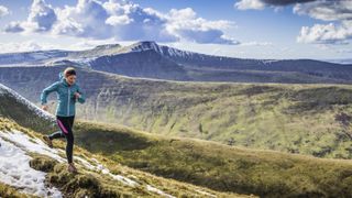 best women's trail running shoes: runner in the Brecon Beacons